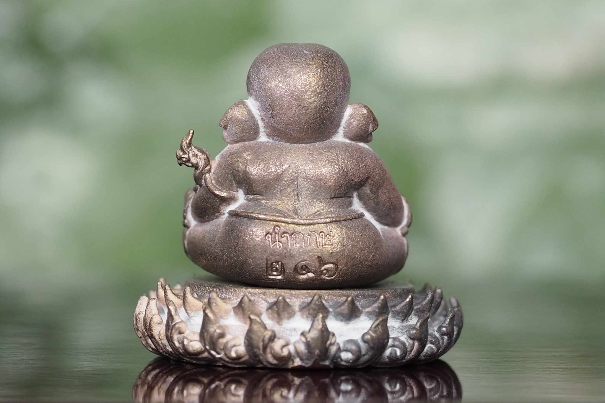 พระพิฆเนศประทับบนฐานบัว รุ่นสร้างโบสถ์ เนื้อสำริดโบราณ(ตอกโค๊ดนำฤกษ์)