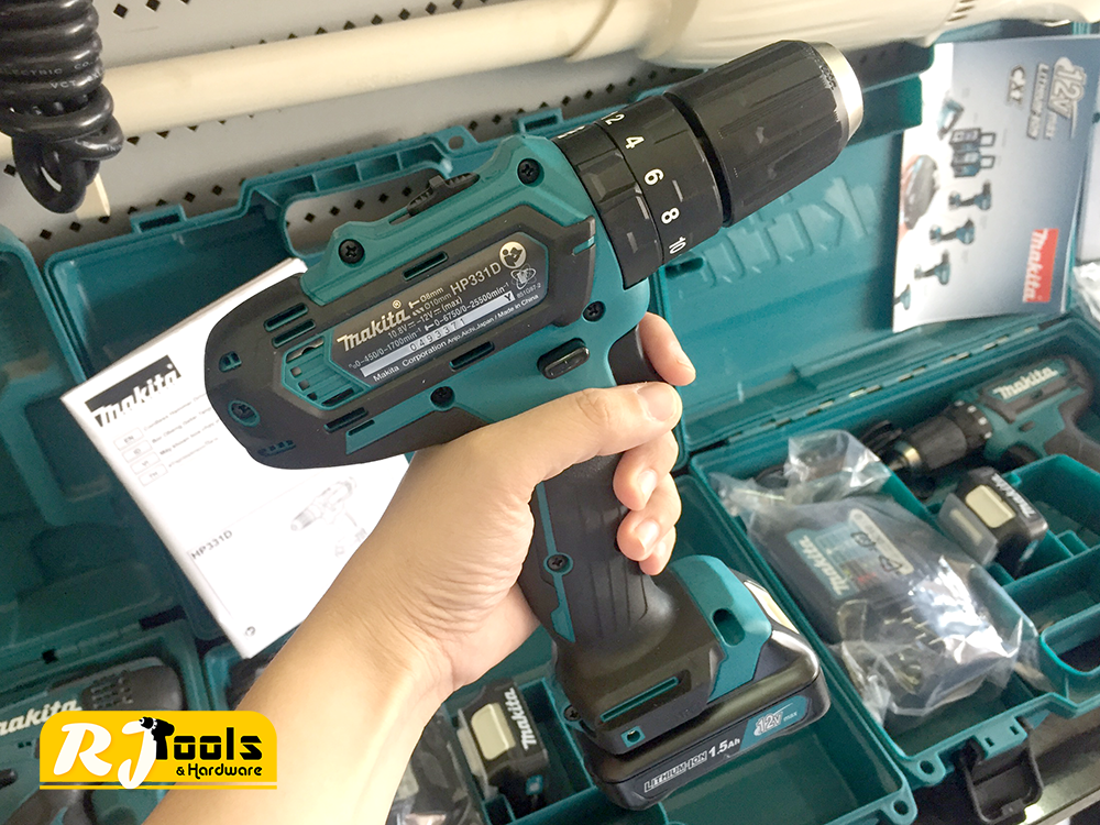 สว่านกระแทกไร้สาย Makita HP331DWYE พร้อมแท่นชาร์จ + แบต Li-ion 12V Max 2 ก้อน