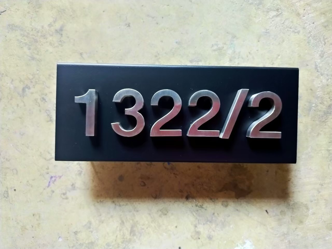 งานป้ายบ้านเลขที่ 1322/2