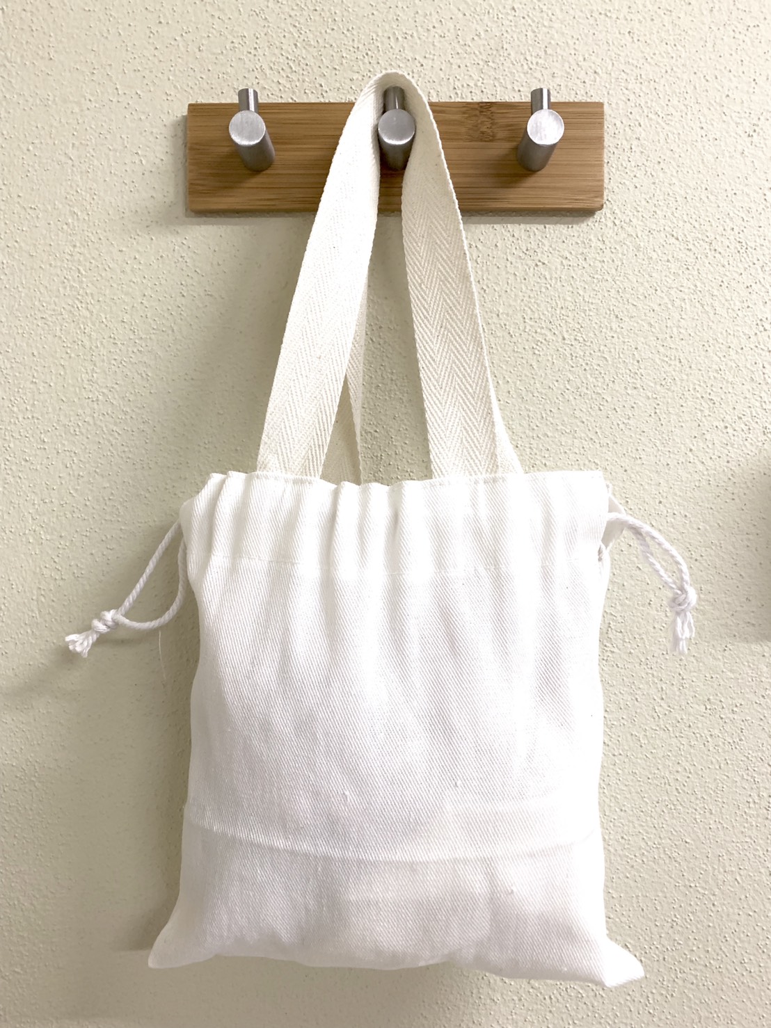 ถุงผ้าดิบลายสองรูดหิ้ว ขนาด 8*8นิ้ว (งานผลิตตามออเดอร์ ขั้นต่ำในการผลิต 300 ใบ)