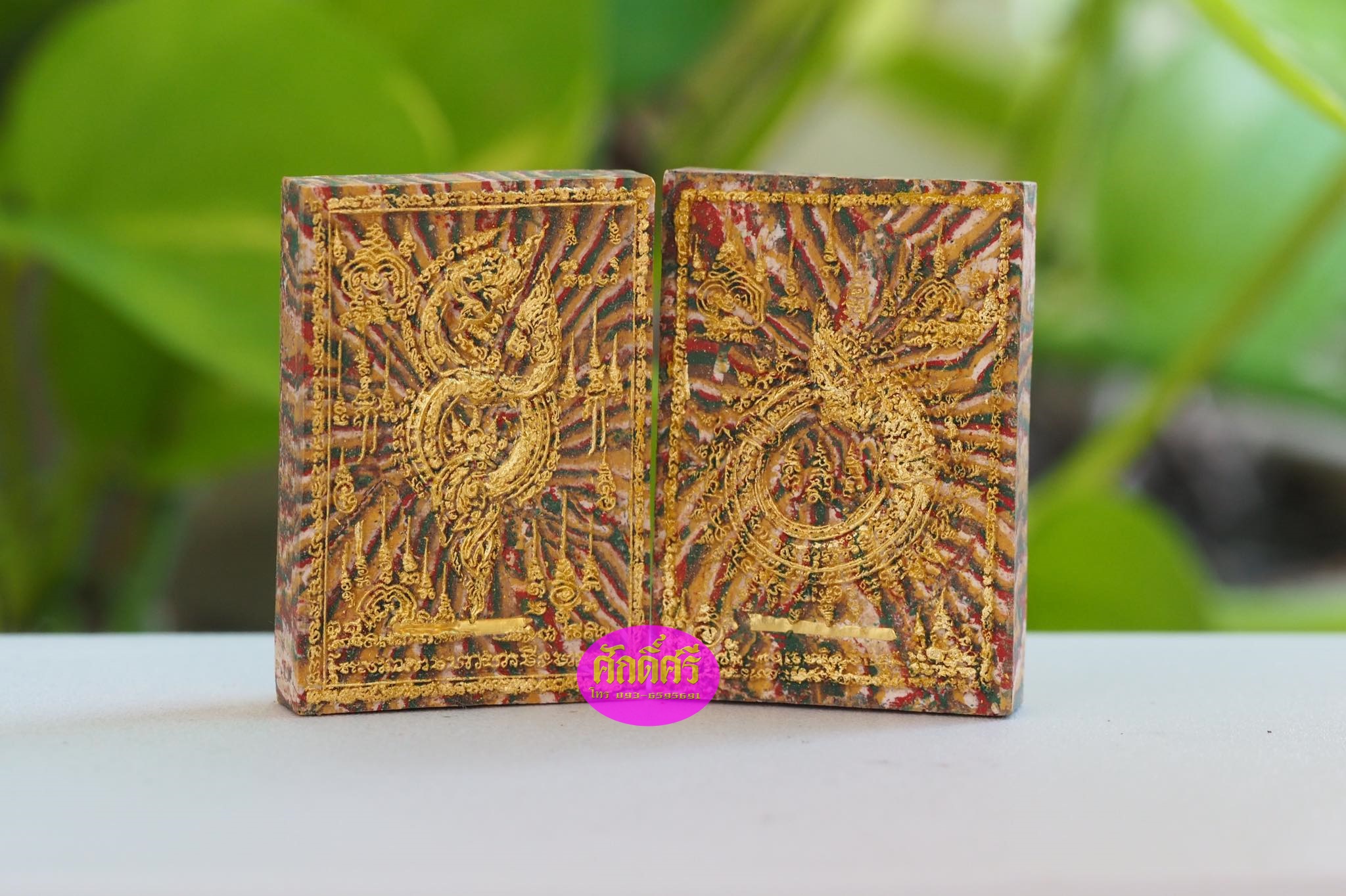 นาคบาศเกี้ยวทรัพย์ เนื้อสายรุ้งรวมมวลสารปัดทองคำแท้ ตะกรุดทองคำคู่