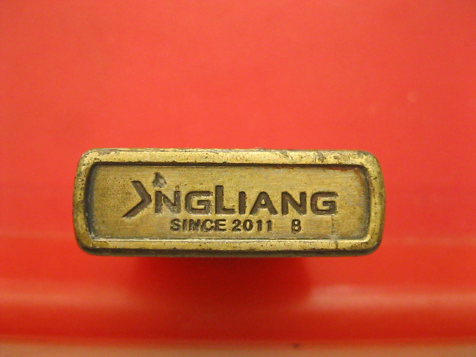 ไฟแช็ค NGLIANG SINCE 2011 B ทองเหลือง (4601)