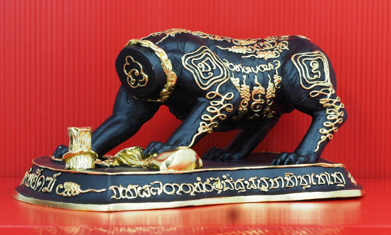 เสือหัวขาด รุ่นราชาพยัคฆ์ ขนาดบูชาเนื้อโลหะสีดำปิดลายทอง