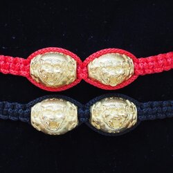 ลูกสะกดจ้าวพยัคฆ์ เนื้อทองระฆัง(คู่)ถักเชือกข้อมือ(ปรับขนาดได้)