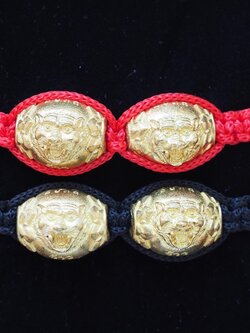 ลูกสะกดจ้าวพยัคฆ์ เนื้อทองระฆัง(คู่)ถักเชือกข้อมือ(ปรับขนาดได้)