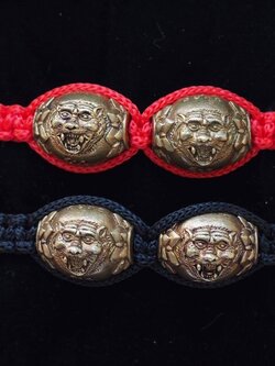 ลูกสะกดจ้าวพยัคฆ์ถักเชือกข้อมือ(ปรับขนาดได้)