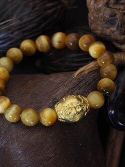 สร้อยหินมงคลร้อยลูกสะกดหน้าเสือ-จ้าวพยัคฆ์เนื้อทองระฆัง