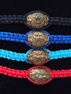 ลูกสะกดจ้าวพยัคฆ์ถักเชือกข้อมือ(ปรับขนาดได้)