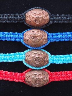 ลูกสะกดจ้าวพยัคฆ์ เนื้อทองแดงมันปู ถักเชือกข้อมือ(ปรับขนาดได้)
